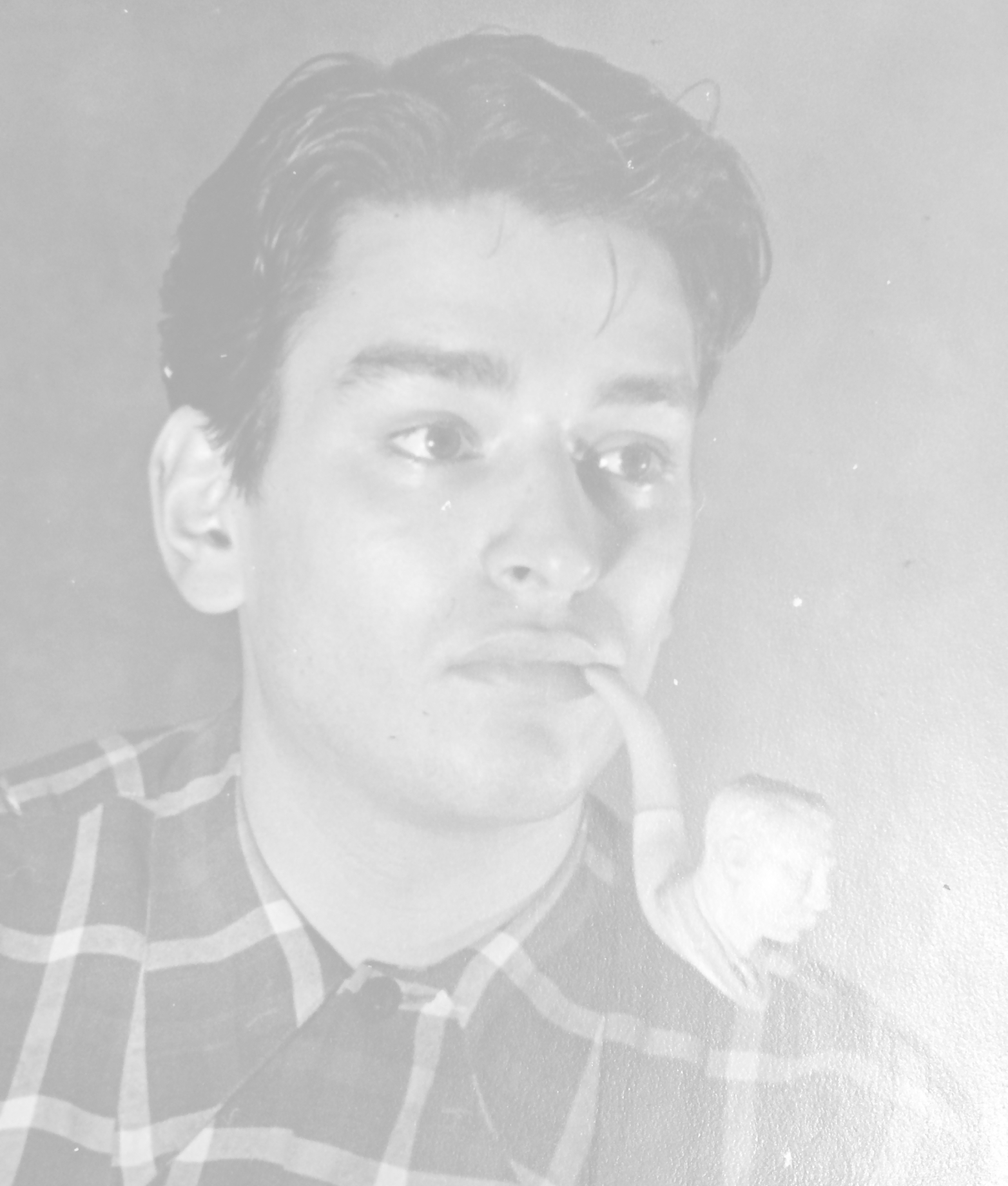 Richard Deane Taylor at 17 years old in 1942 smoking one of his many hand-carved Meerschaum pipes.