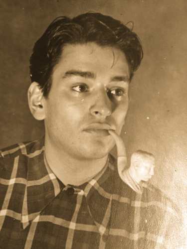 Richard Deane Taylor at 17 years old in 1942 smoking one of his many hand-carved Meerschaum pipes.