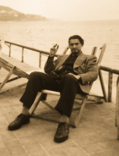 Richard lounging and smoking.