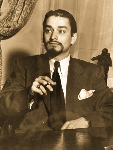 Richard smoking a cigarette.