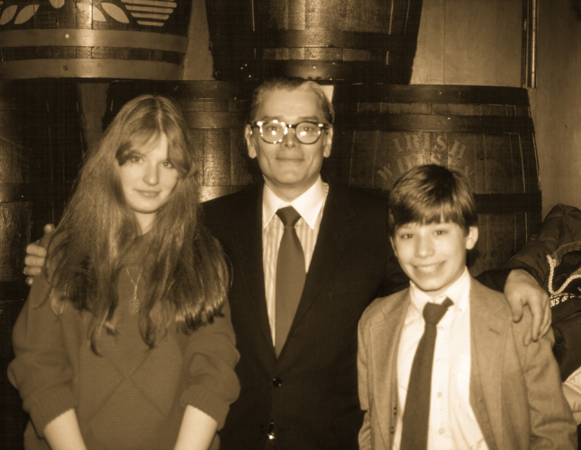 Richard posing with both of his children.